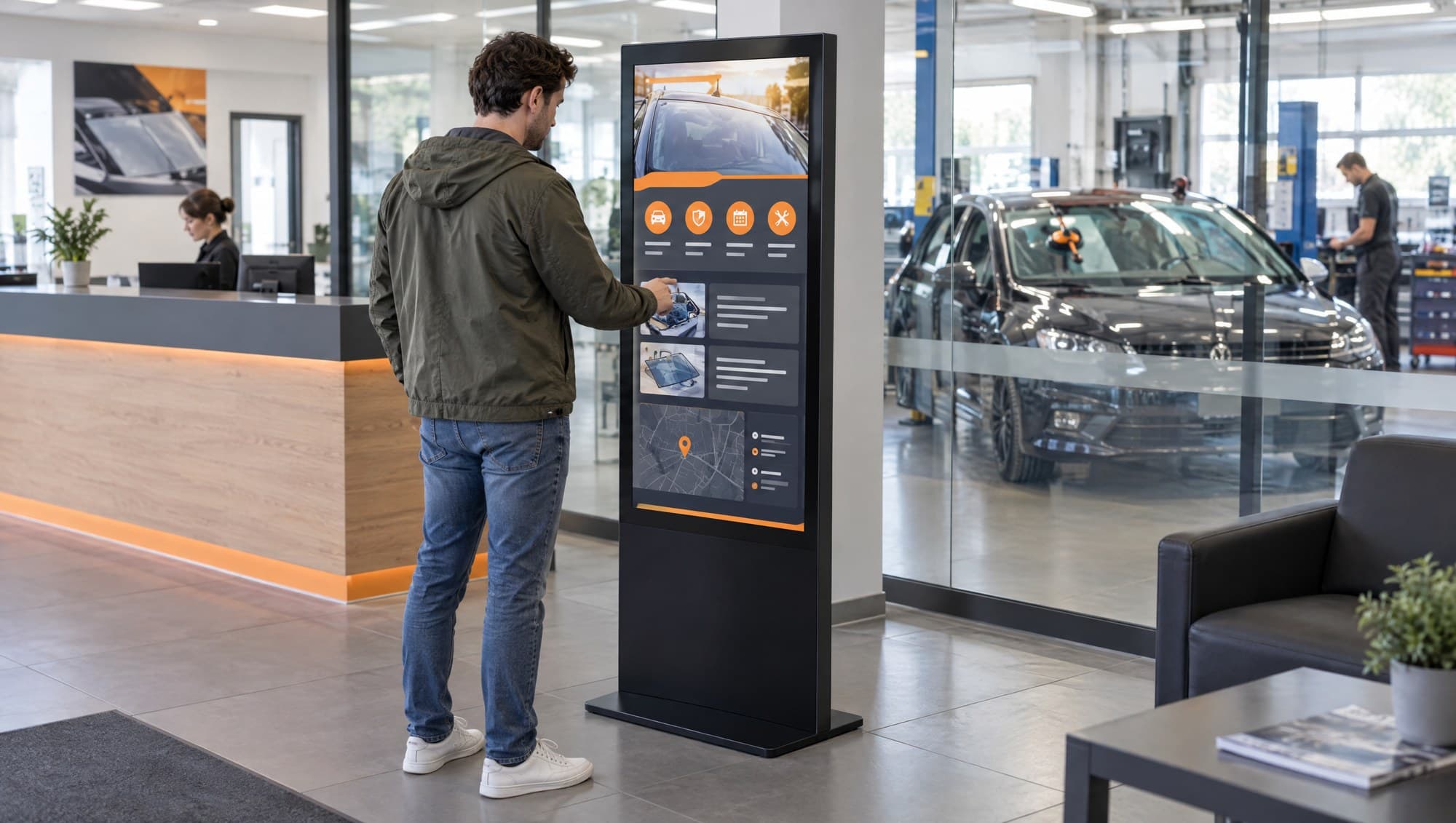 Large digital kiosk in the entrance area of a showroom.